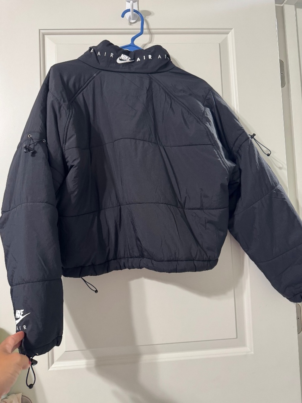 black Nike Air cropped padded synthetic jacket with white "Nike Air" size small